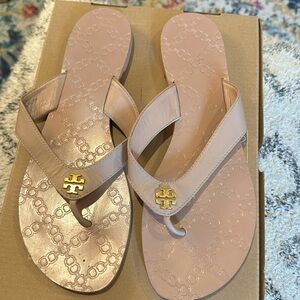 Tory Burch tan leather flip flops